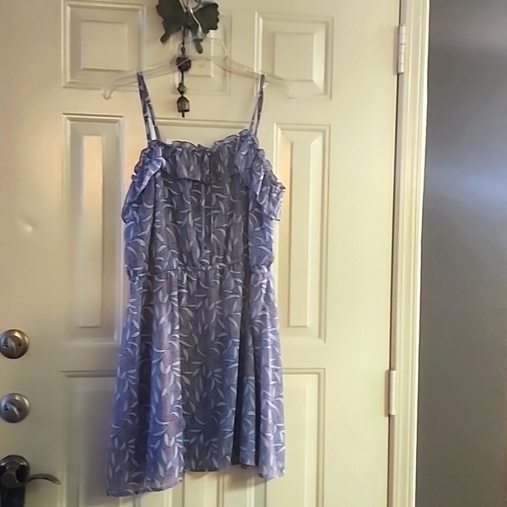 Sweet feminine dress with a top ruffle